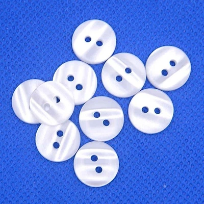 WHITE PEARLESCENT 2 HOLE BUTTONS Size 13mm - Image 1 of 2