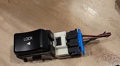 02-07 Interruptor de cerradura de puerta Buick Rendezvous 10442934 delantero GM DS2126 OEM fábrica Foto 1 de 4