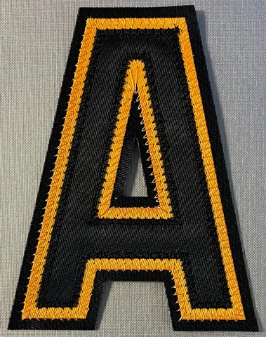 BOSTON BRUINS ALTERNATE CAPTAIN "A" PATCH 2022-23 REVERSE RETRO JERSEY MARCHAND Cover