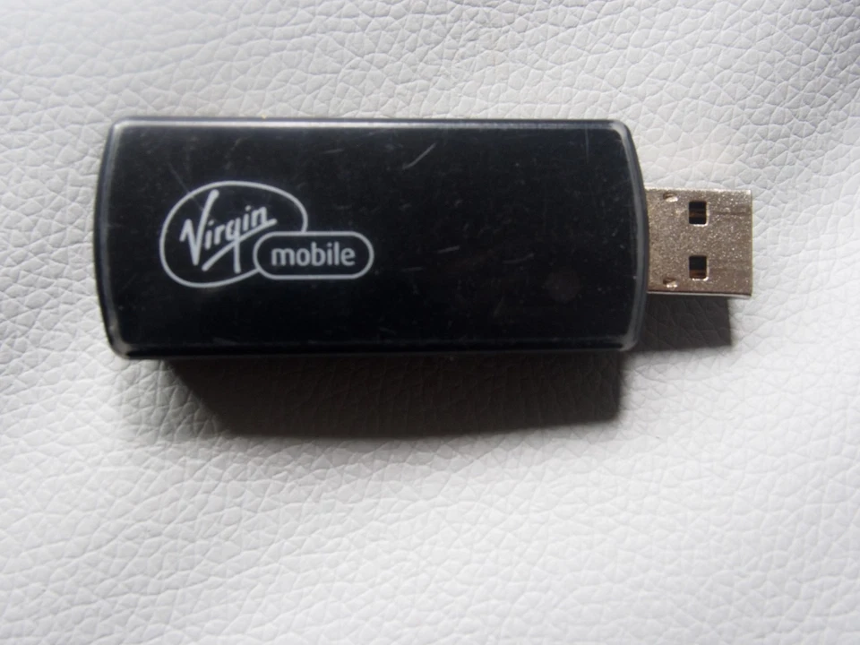 Virgin Mobile MC760 Mobile Modem Novatel 3G CDMA -  AS IS READ CONDITION NOTE - Image 1 of 4
