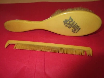 Juego de peine y cepillo vintage de 2 piezas para bebé marfil con plata "bebé" en la parte superior Foto 1 de 4