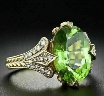 Anillo de compromiso de peridoto creado en laboratorio de corte ovalado de 3,00 quilates enchapado en oro amarillo de 14 quilates Foto 1 de 4
