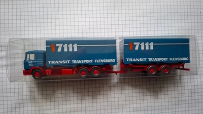 1/87 WIKING Serienmodell MAN F90 Wechselkoffer-Tandemhängerzug "17111 TRANSIT T" - Bild 1 von 3