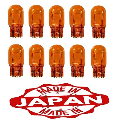 10x Japan 7443 AMBER STOCK TAIL LIGHT T20 BRAKE STOP TURN SIGNAL BULBS 7443NA - Image 1 of 2