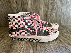 red checkerboard high top vans