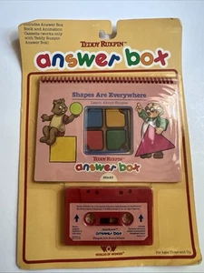 Caja de respuestas Teddy Ruxpin libro y formas de casete están en todas partes 1985 1988 nuevo - Imagen 1 de 3