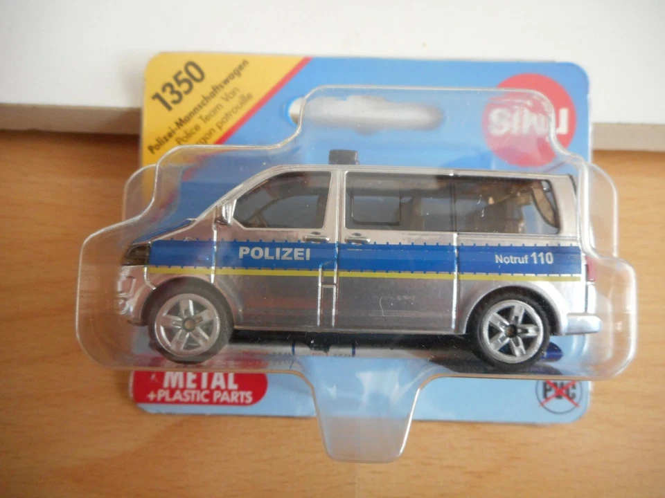 Siku VW Volkswagen Transporter Police 110 en gris/bleu sous blister (Siku 1350) - Photo 1/1