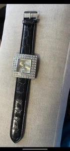 woman’s chanel rinestone wrist watch 