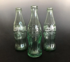 Coca-Cola Bottles Lot of 3 Two Coke Classics and One Coeur D'Alene Idaho Bottle - Picture 1 of 9
