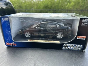 MAISTO - 2004 CHEVROLET IMPALA SS (BLACK) - 1/18 DIECAST Special Edition - Picture 1 of 8