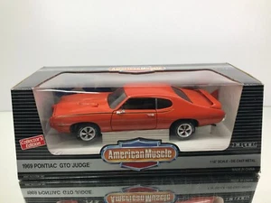 ERTL 7467 PONTIAC GTO JUDGE 1969 -ORANGE 1:18- GOOD IN BOX - Picture 1 of 9
