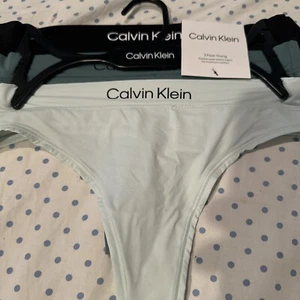 WOMENS SIZE MEDIUM CALVIN KLEIN THONG UNDERWEAR 3 PAIR BLUE GRAY BLACK - Picture 1 of 9