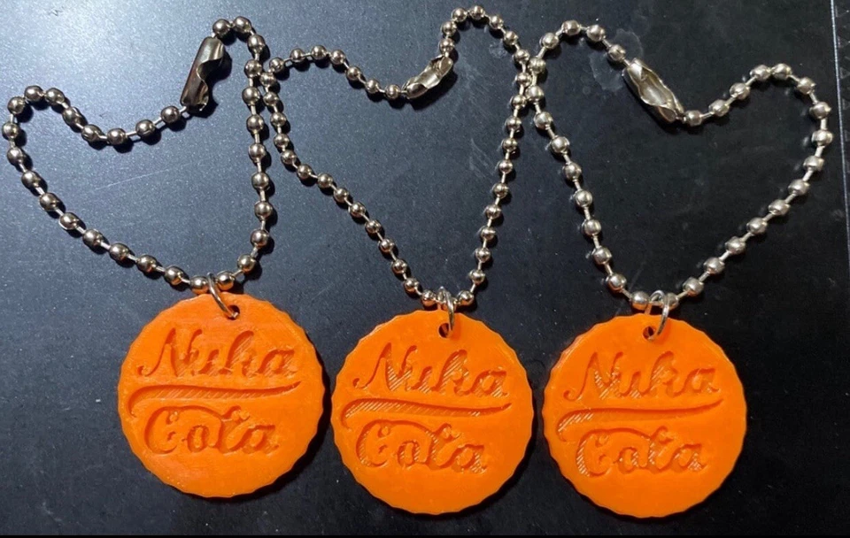 Fallout Nuka Cola帽子购物车硬币钥匙扣 — 第 1/1 张图片