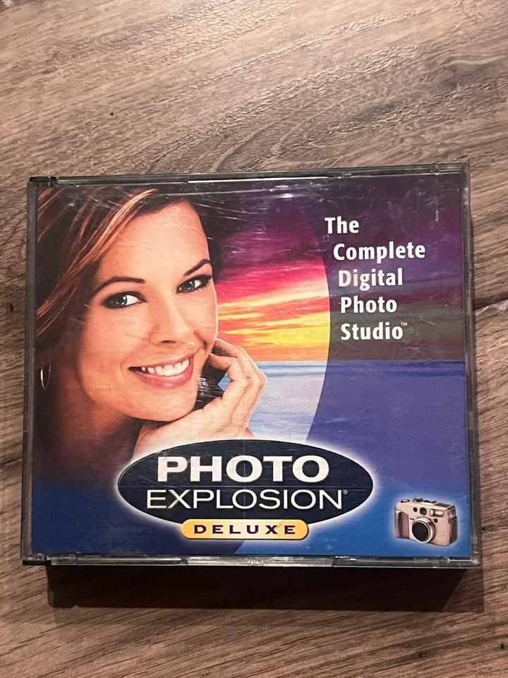 Photo Explosion Deluxe PC DVD-ROM Digital Photo Studio Deluxe 4-CDs - Image 1 of 4