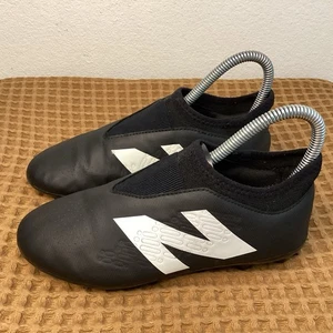 New Balance Stollen Kinder Jungen Gr. 2 Tekela V4 Magique FG Fußballschuhe schwarz - Bild 1 von 7