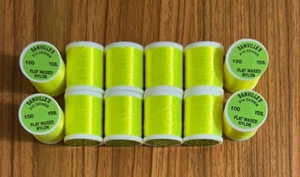 12 Spulen Danville flach gewachst fluoreszierend gelb Fliegenbindegarn - Bild 1 von 1
