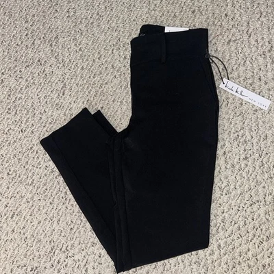 Pantalones de vestir Nicole Miller New York negros elásticos tiro medio pierna ajustada XS Foto 1 de 4