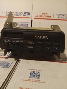 SATURN AM/FM Radio RECEIVER PLAYER 21022996 - Picture 1 of 6