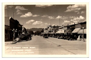 MONTROSE, COLORADO - BUSY MAIN STREET FROM WEST - OLD REAL PHOTO POSTCARD - Picture 1 of 2