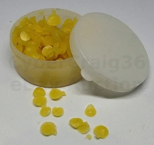 BROCAS DE PELLETS DE CERA DE MAGO AMARILLO PARA TARJETAS DE HILO INVISIBLE, TRUCO DE MAGIA MONEDA - Imagen 1 de 4