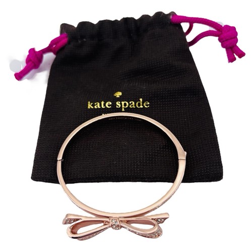Bracciale Kate Spade New York oro note d'amore fiocco cerniera pavè cristallo con sacchetto antipolvere