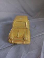 Unique collectable Ceramic Little Yellow Car Port Bottle