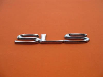 98 99 00 01 02 03 04 CADILLAC SEVILLE SLS EMBLEMA TRASERO CROMADO LOGOTIPO INSIGNIA FABRICANTE DE EQUIPOS ORIGINALES #1 Foto 1 de 4