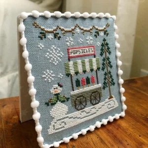COUNTRY COTTAGE NEEDLEWORKS Cross Stitch Pattern Snow Village POPCICLE CART - Picture 1 of 2