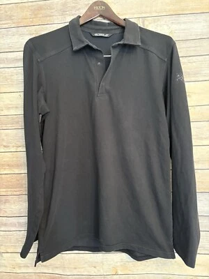 Polo Arc’teryx Captive 1/4 Snap Manga Larga Talla Pequeña Negro Foto 1 de 4