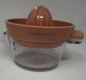 Kitchen Aid Eighteen Ounce Dishwasher Safe Citrus Juicer in Pink Grapefruit. - Picture 1 of 8