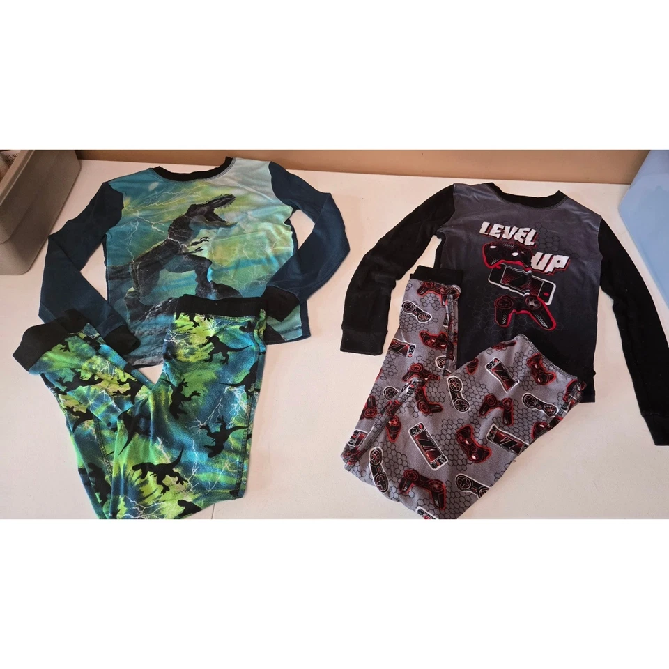 Lote de pijamas para niños talla 12 - Pijamas Dino Lightning & Gamer Level Up - Cuddl Duds Foto 1 de 4