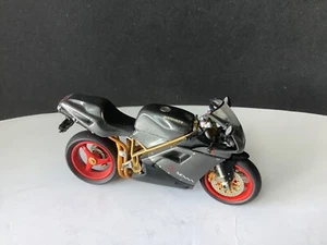 Motocicleta ONYX XM034 1:24 DUCATI 916 SP 'SENNA' - Imagen 1 de 6