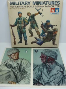 TAMIYA KIT 1/35 COD. MM112 GERMAN PARACHUTER 4 FIG. + 2 CARTOLINE RIPRODUZIONI - Foto 1 di 11