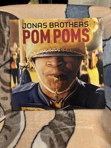 JONAS BROTHERS POM POMS 10” YELLOW RED SPLATTER VINYL JONAS VINYL CLUB EXCLUSIVE - Bild 1 von 2