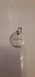 Round Metal Nine West Tag Keychain Fob Advertisement - Picture 1 of 2