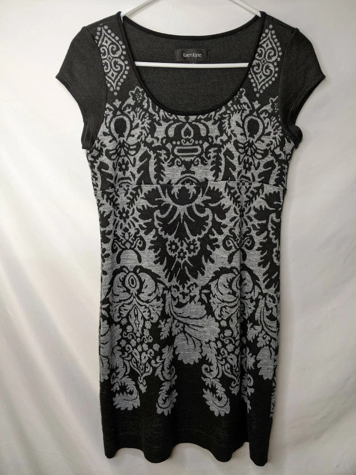 Vestido para mujer Karen Kane pequeño negro suéter manga corta estampado cuello redondo Foto 1 de 4