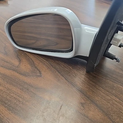 Espejo retrovisor manual Chevrolet Aveo 2007-2011 vista lateral izquierda fabricante de equipos originales Foto 1 de 4