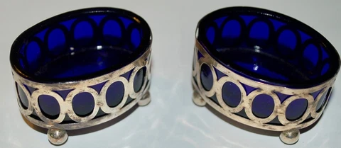 Vintage pair Art Deco sterling and cobalt footed salt cellars Cover