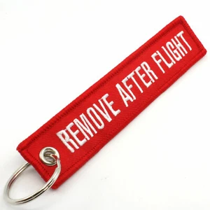 REMOVE AFTER FLIGHT KEYCHAIN QTY= 1 PC COLOR = RED/white TAGS FLAGS PILOT CREW - Picture 1 of 3
