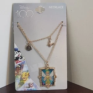 NEU Disney 100 Jahre Jubiläum Peter Pan Tinker Glocke Halskette Neon Dienstag - Bild 1 von 3