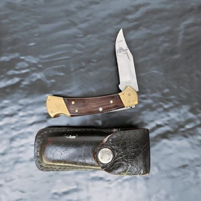 Buck 112 Ranger USA Folding Lockback Pocket Knife Wood Brass + Leather Sheath - Image 1 of 4