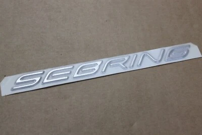 98-00 Chrysler Sebring emblema izquierdo 5288783AA placa de identificación placa de identificación OEM de fábrica Foto 1 de 4