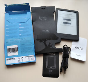 NEW AMAZON KINDLE - AN UNWANTED GIFT - NEVER USED - BUNDLED WITH SEPARATE COVER