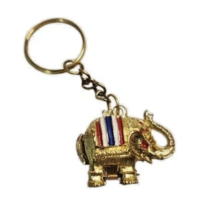 Llavero medallón elefante vintage años 90 tono dorado - Imagen 1 de 4