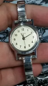 Vintage Timex Women's Silver Tone Stretch Band Hand-Wind Mechanical Watch - Picture 1 of 10