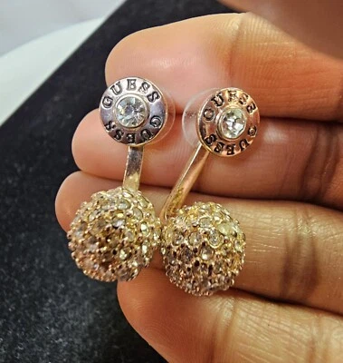 Aretes de bola discoteca de metal oro rosa Guess con piedras transparentes - S88 Foto 1 de 4