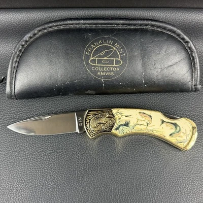 Cuchillo vintage Franklin Mint Collector Trucha Lockback tono dorado con bolsa Foto 1 de 4
