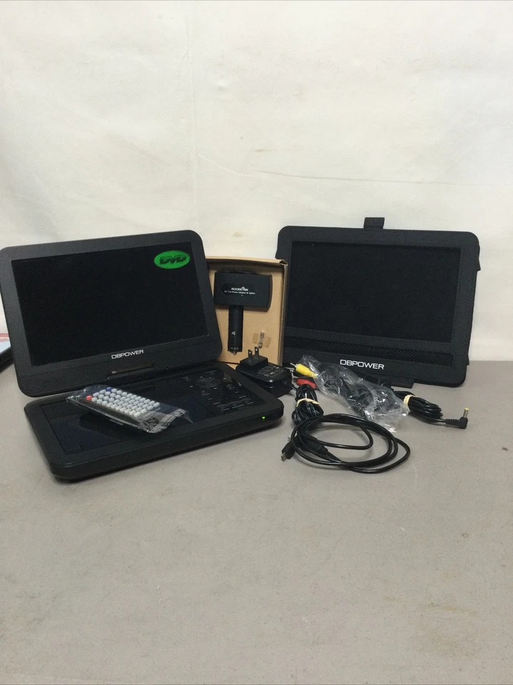 DBPower Model SY-03 10" Portable DVD Player With Remote, Cables And Accessory’s. - Image 1 of 4