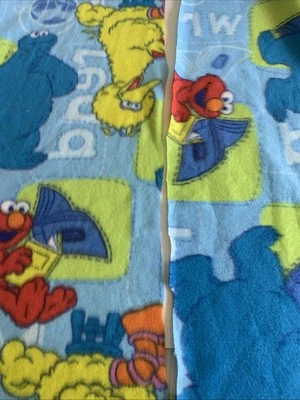 Fabric Fleece Sesame Street Odd Piece. 60 By 17 1/2 And 53 By 19 Inches - Image 1 of 4