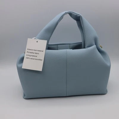 Cartera con asa acolchada de cuero vegano bolso de mano azul claro terciopelo microfibra Foto 1 de 4